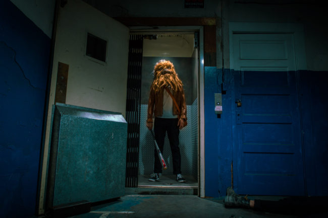 Photograph by Mako Miyamoto. Wookie with a bat standing in an old elevator. Part of the Holding Off Eternity series for a show at Gallery 135 in Portland, OR